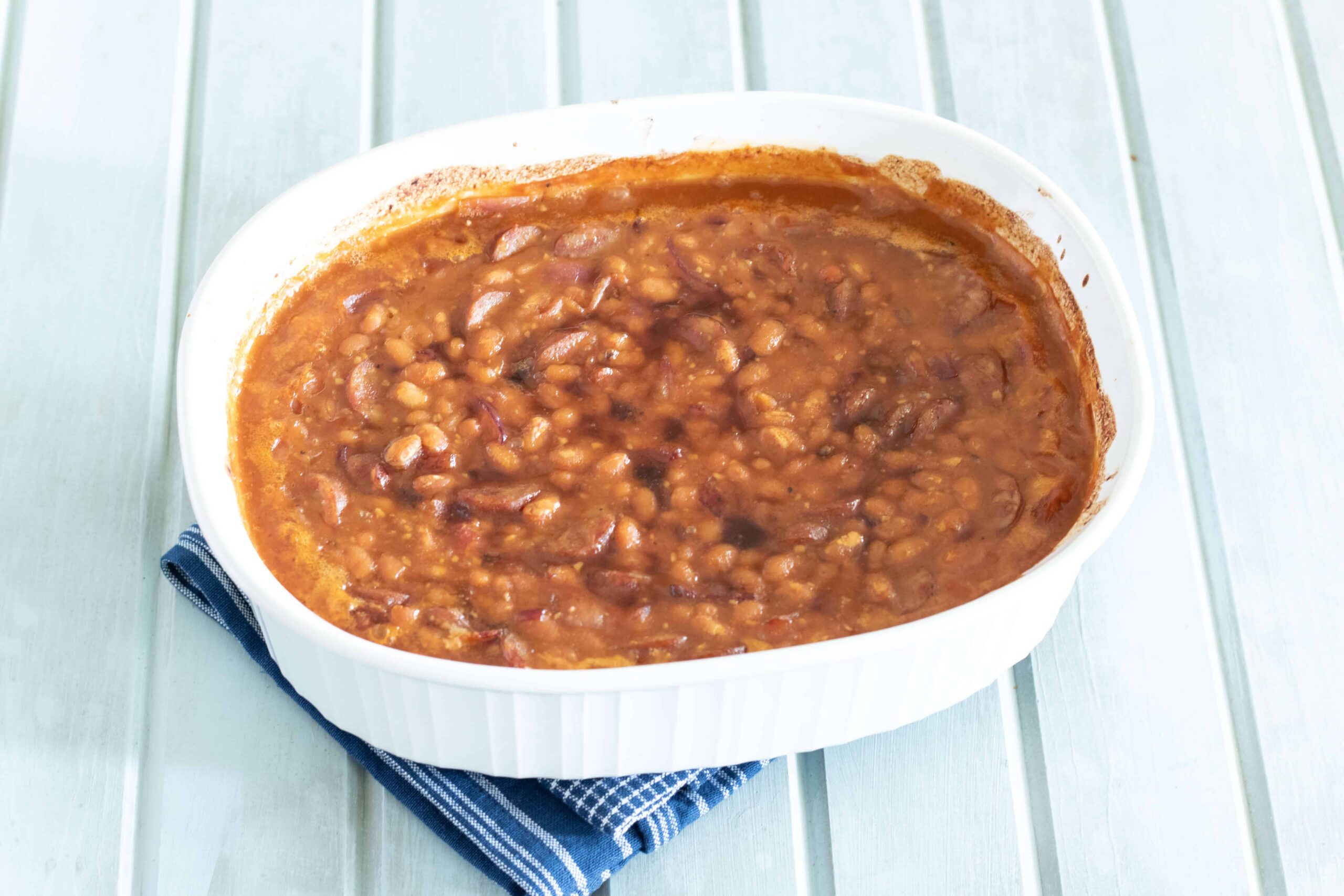 cooked casserole dish of bbq baked beans.