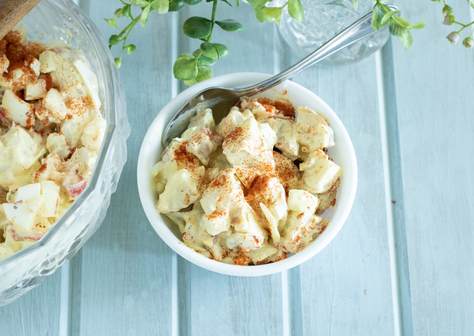 potato salad in a white bowl