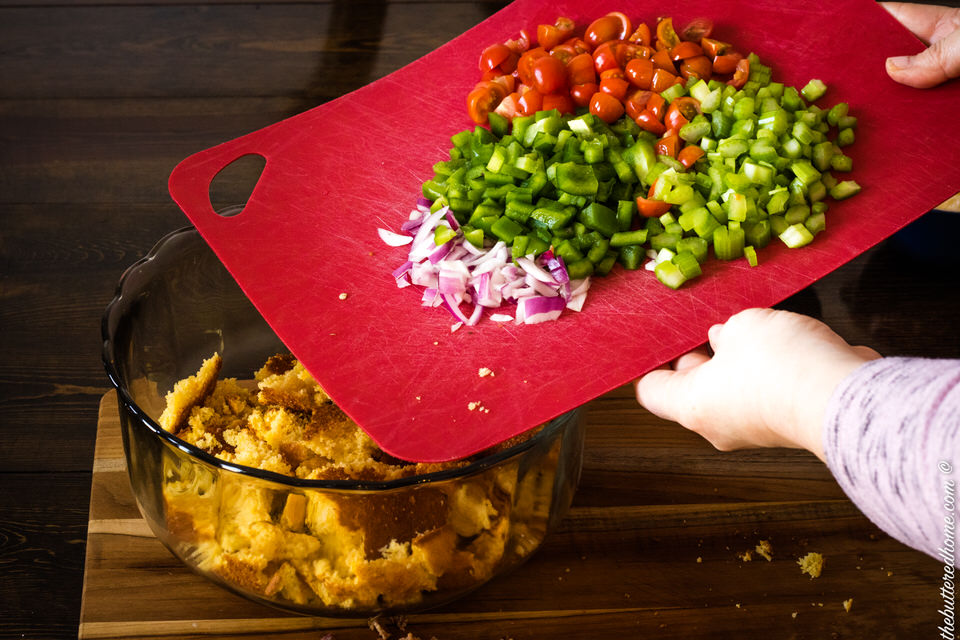 adding vegetables to bacon cornbread salad