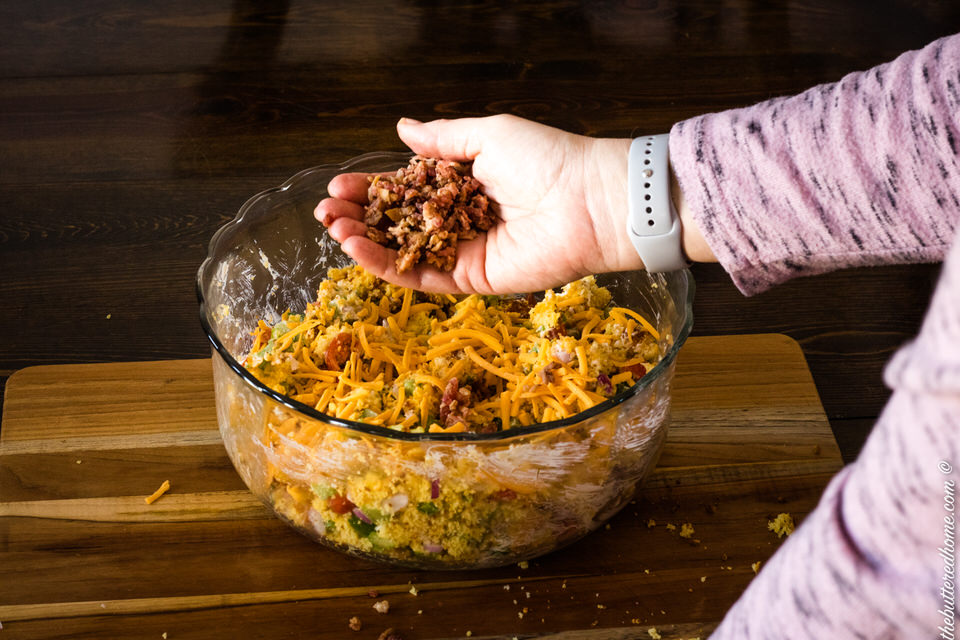 adding bacon to bacon cornbread salad