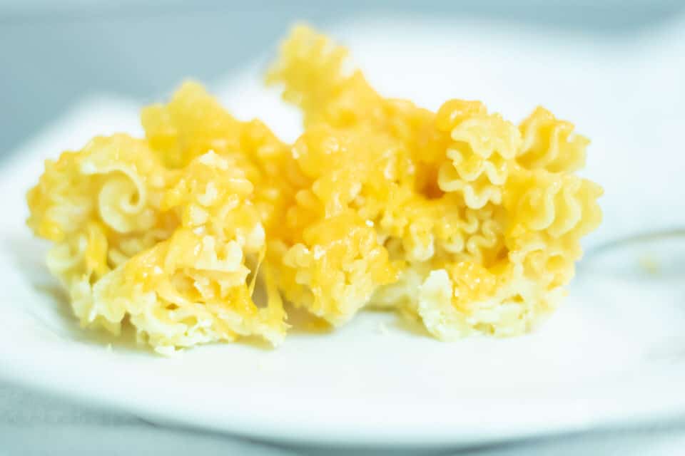 Macaroni and cheese on a white plate
