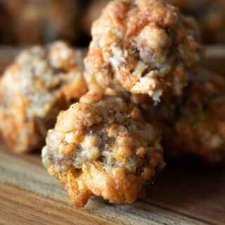 sausage balls on a wooden plate