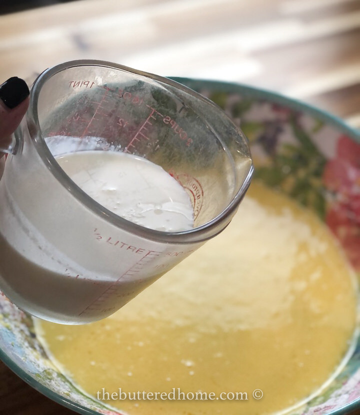 adding buttermilk to eggs and sugar