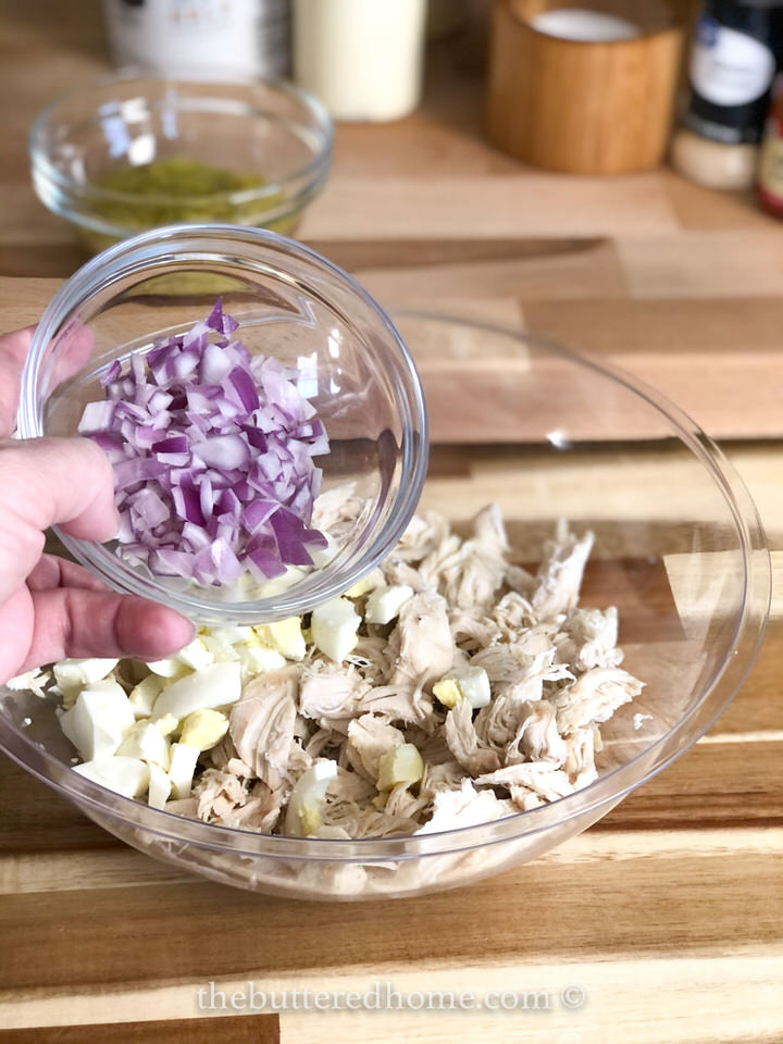 adding chopped red onion