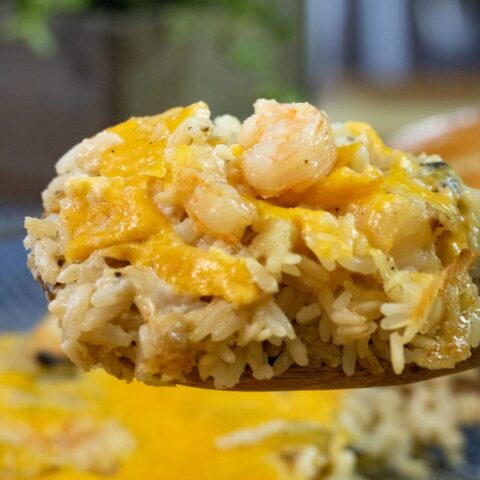 close up of shrimp creole casserole in spoon