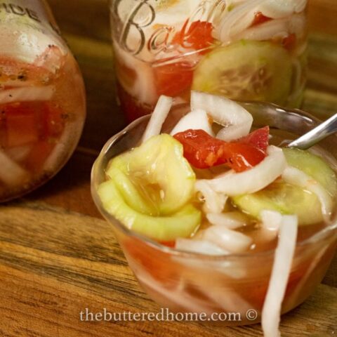 close up of tomato onion and cucumber salad