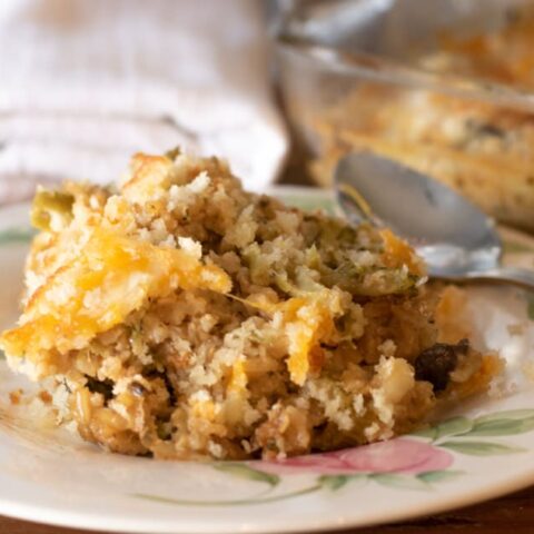 broccoli and brown rice casserole on a floral dish