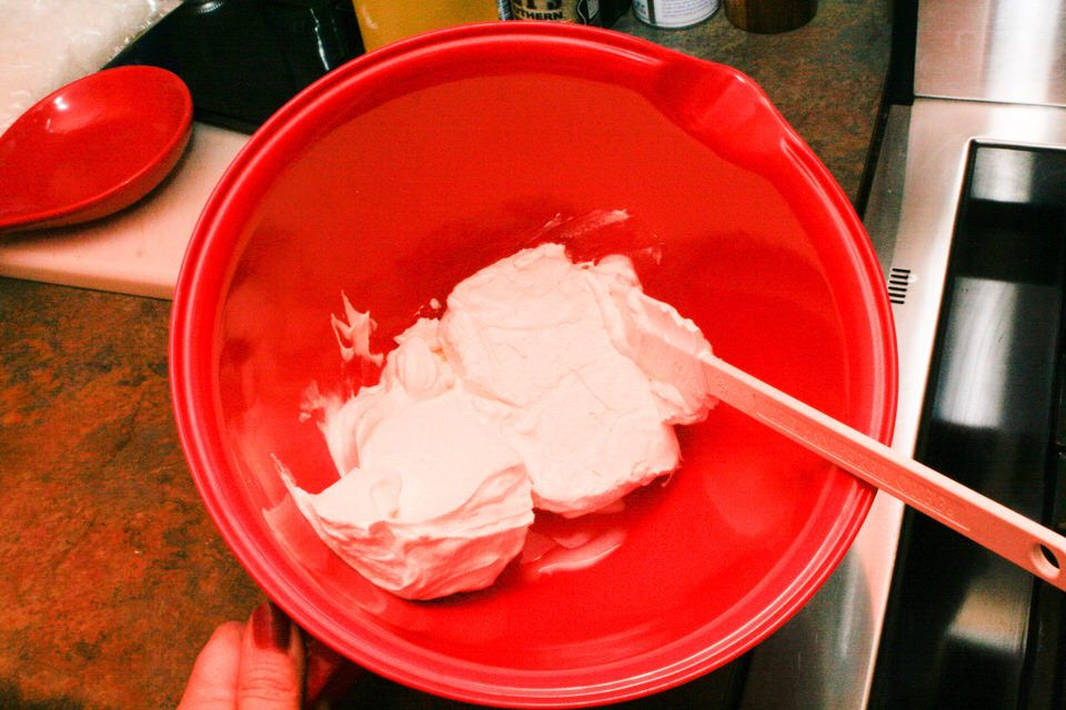 creaming cream cheese and sour cream together