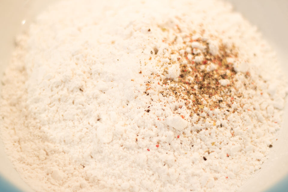 flour and spice mixture to bread the chicken