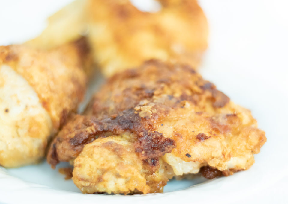 close up of fried chicken thigh