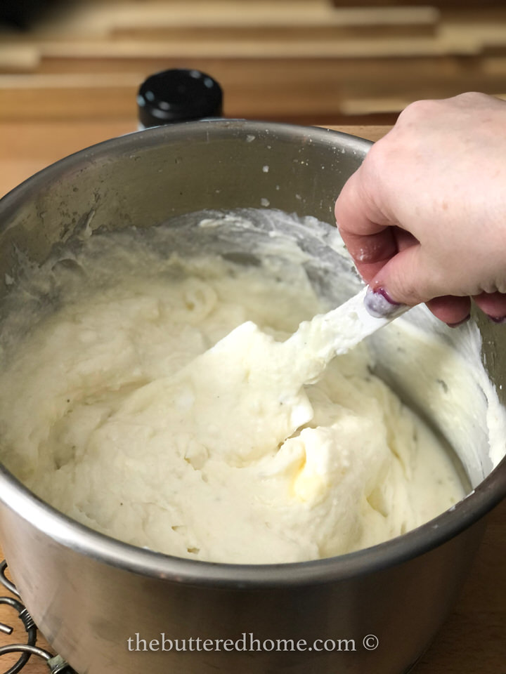 mixing all potato ingredients in a large pot