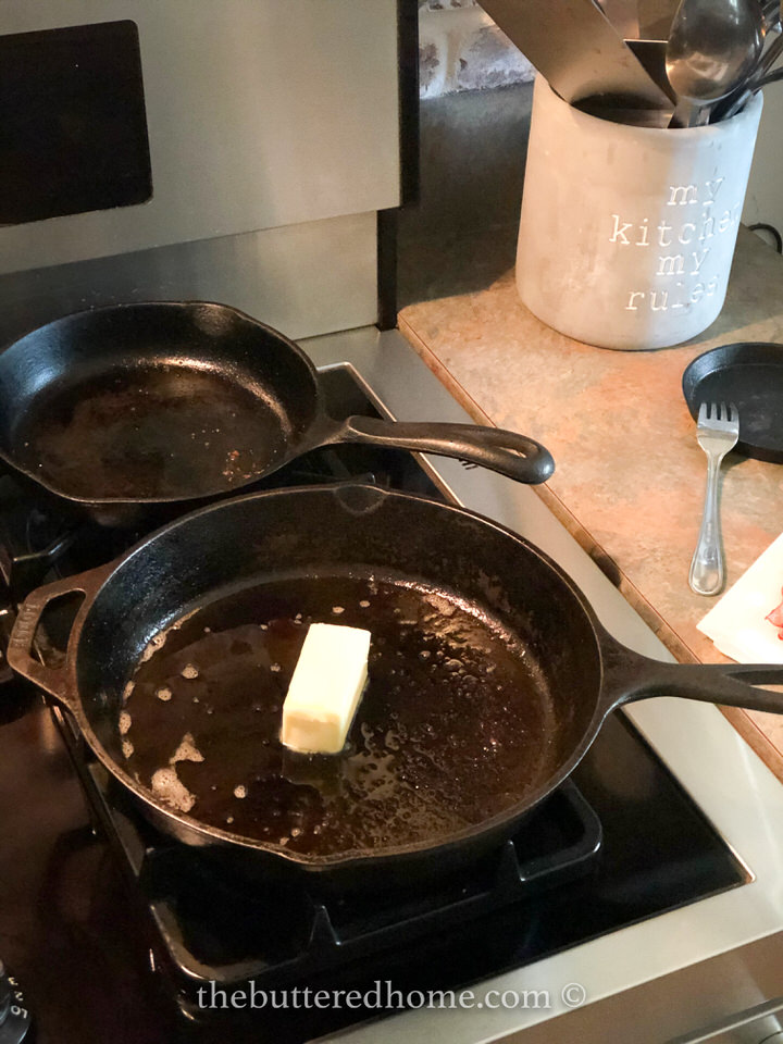 melting butter in a cast iron pan