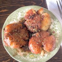 potatoes with parsley on a green plate