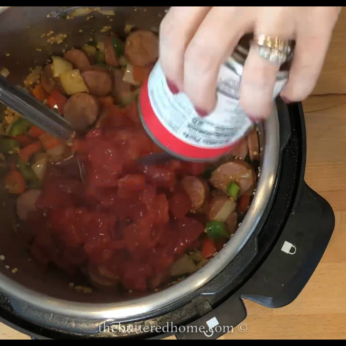adding diced tomatoes
