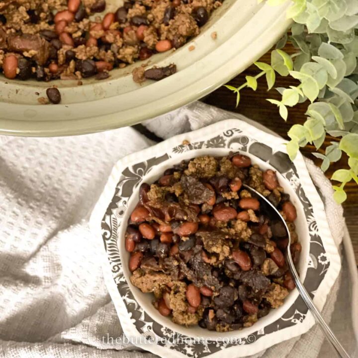 cowboy beans in a black and white bowl