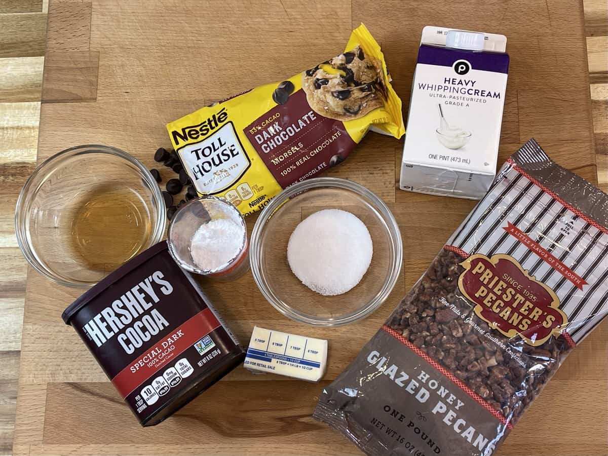 ingredients on a wooden board for mocha truffles with pecans