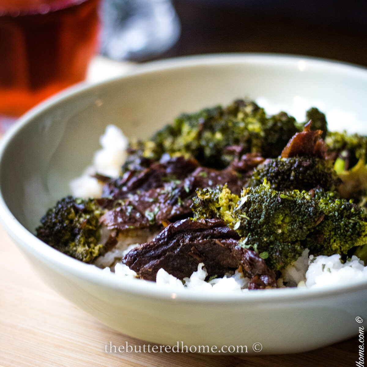 Crock Pot Beef and Broccoli in a green bowl