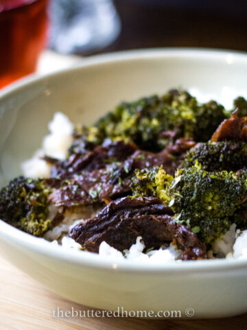 Crock Pot Beef and Broccoli in a green bowl