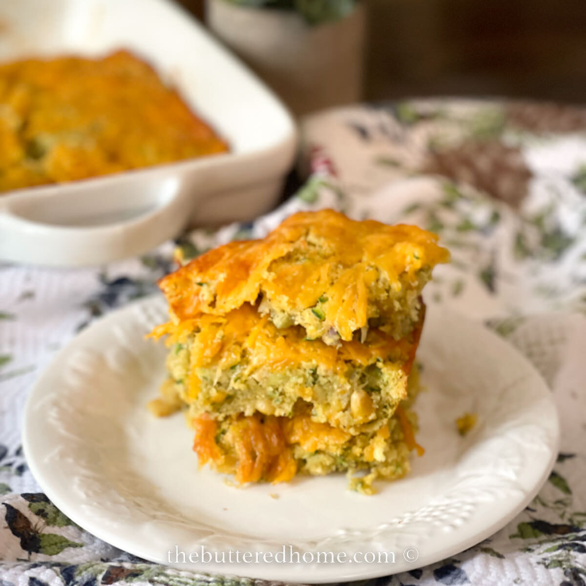 cornbread stacked on a white plate