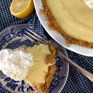 overhead view of slice and whole lemon icebox pie