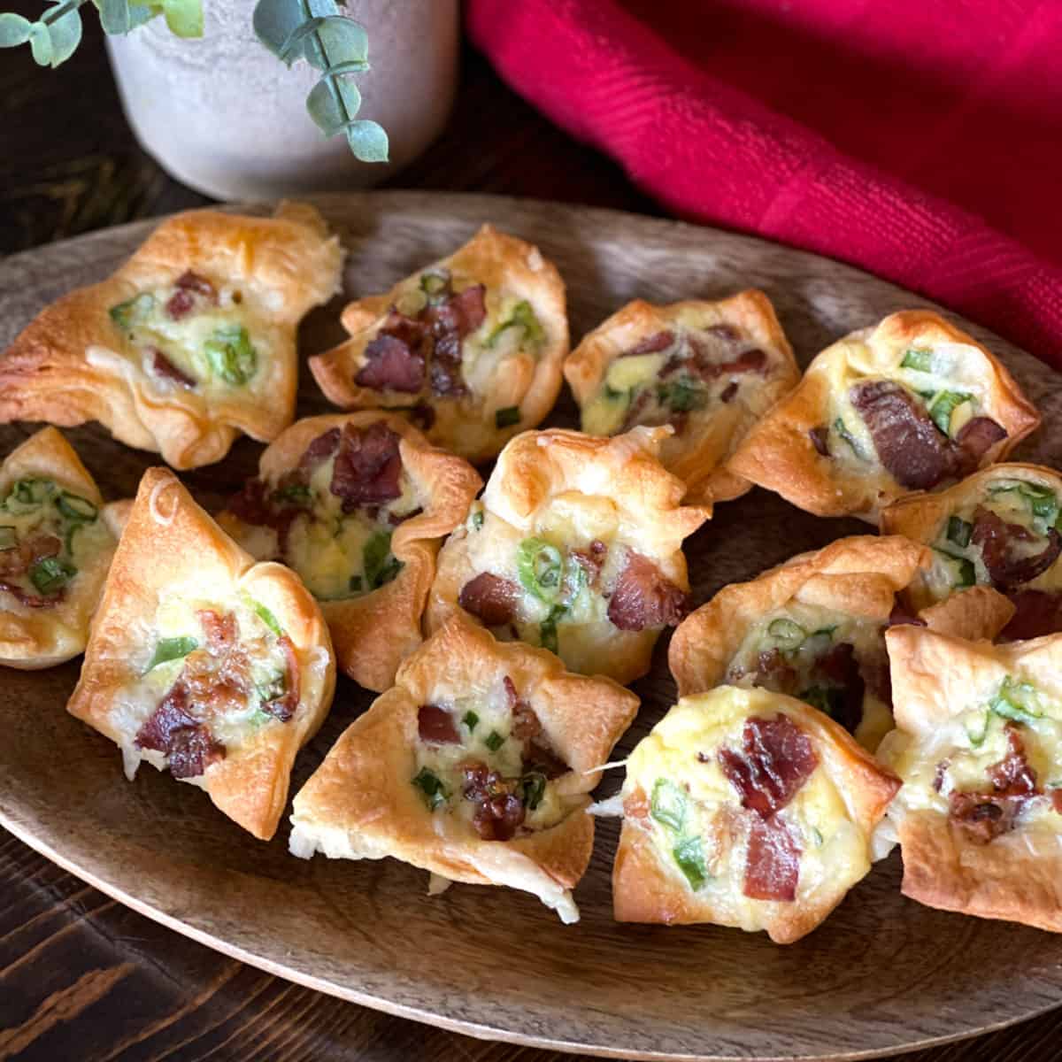 brown platter with tarts.