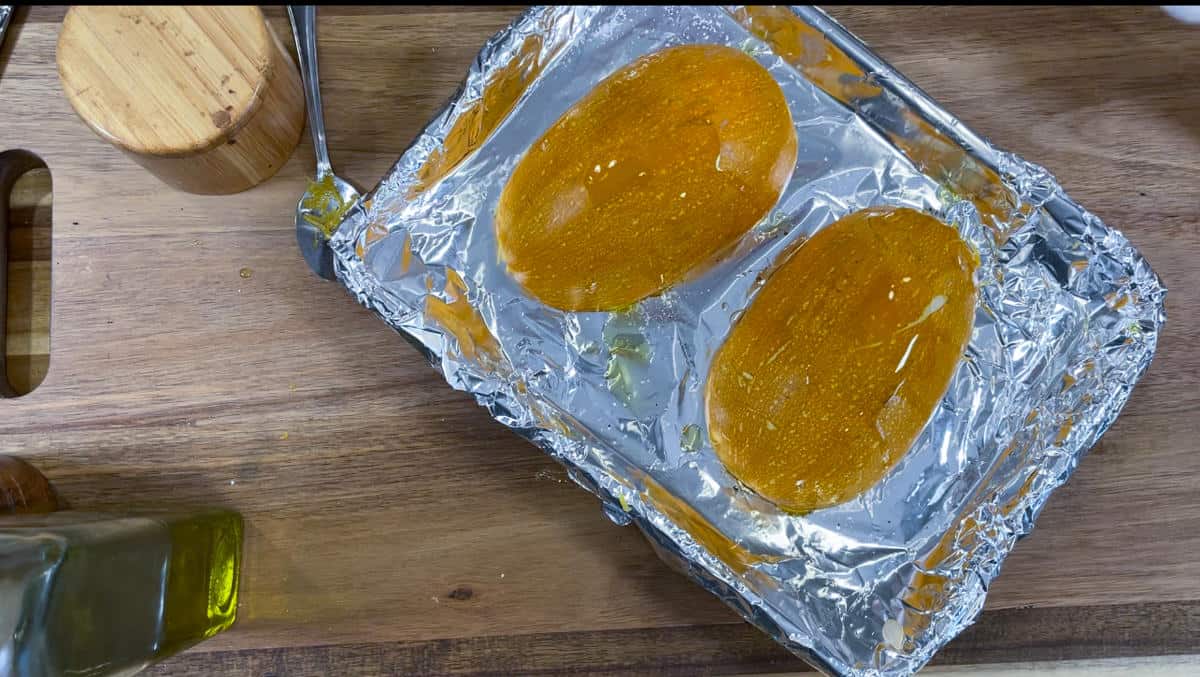 turned the squash upside down on a foil lined pan.