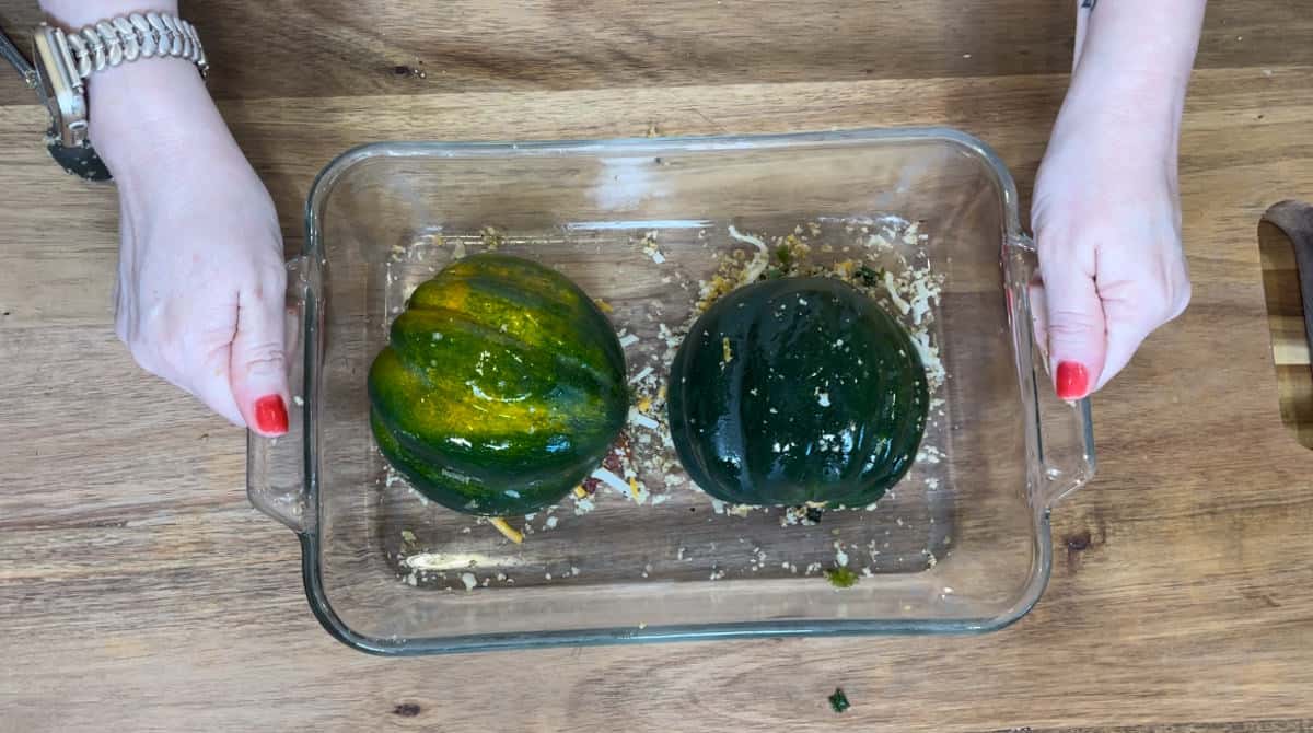 place the squash cut side down in a baking dish.