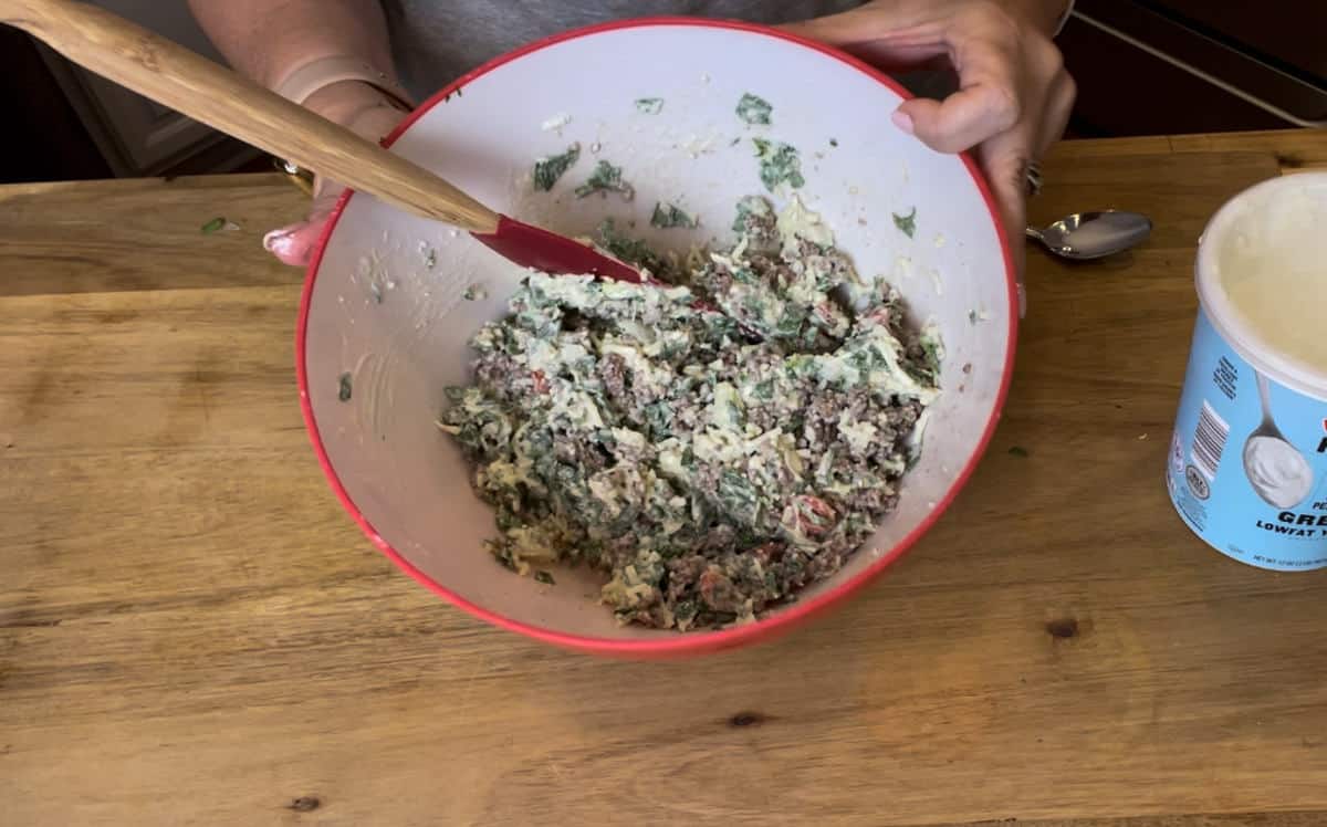 Mix the stuffing well in a large bowl.