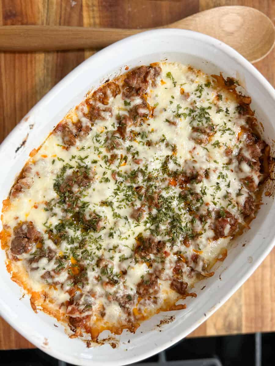 White casserole dish of sour cream beef bake.