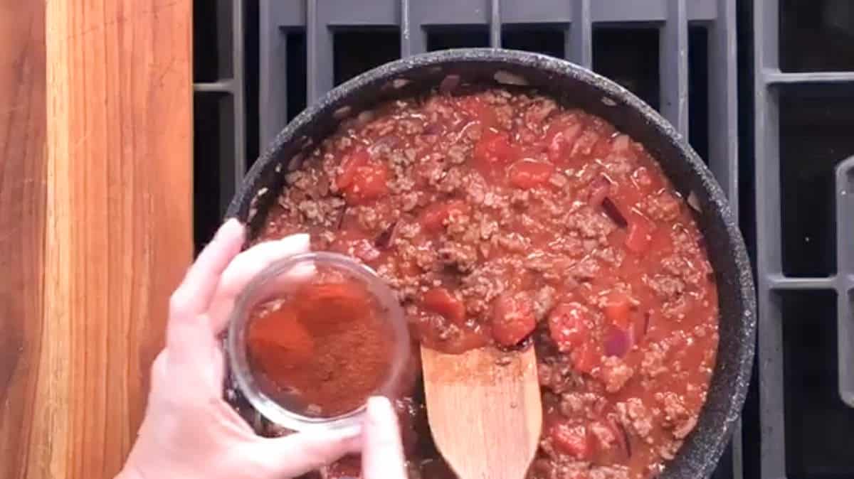 Adding paprika, cayenne and chili powder.