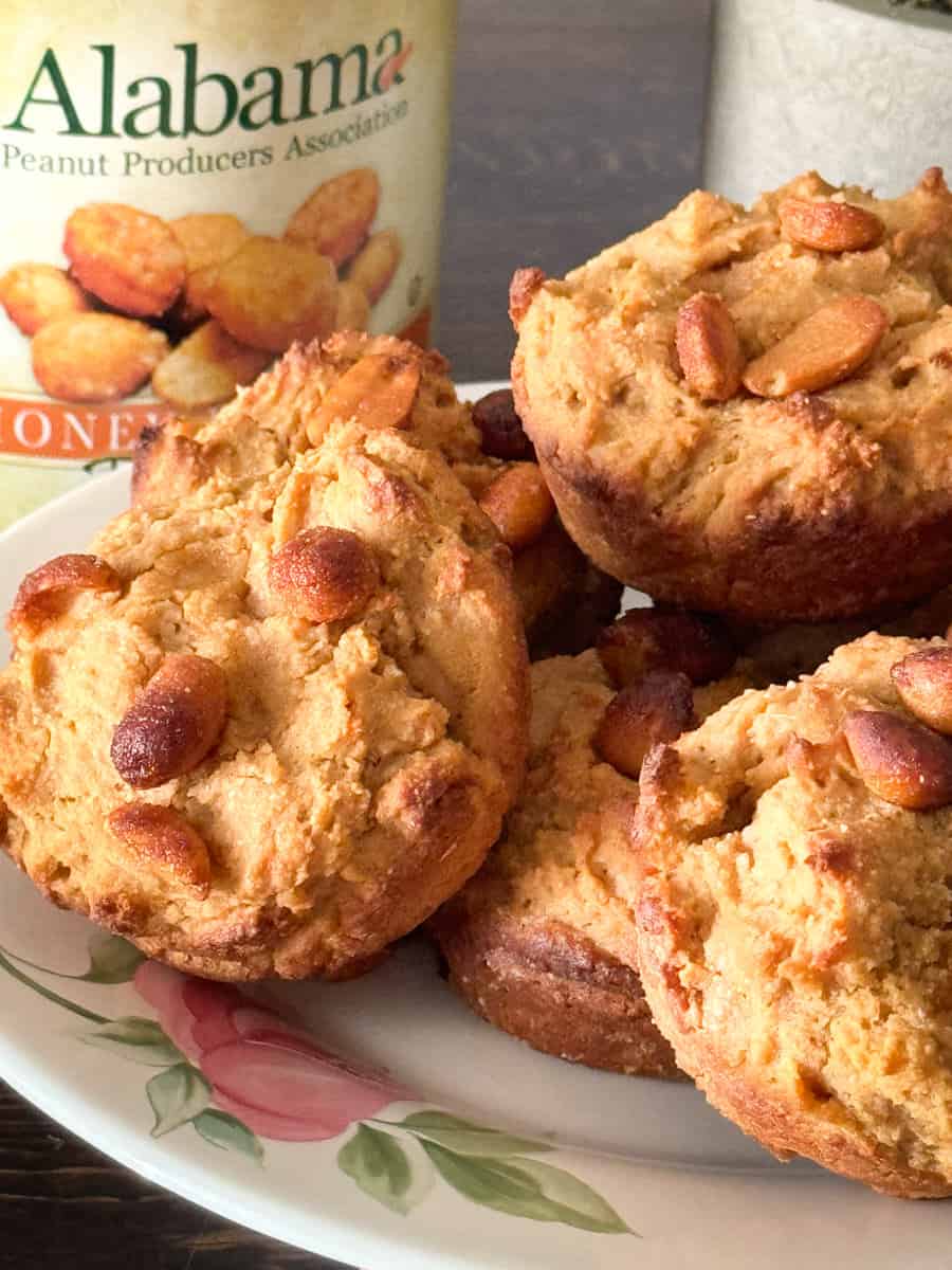 Peanut butter corn muffins with a can of Alabama peanuts in the background.