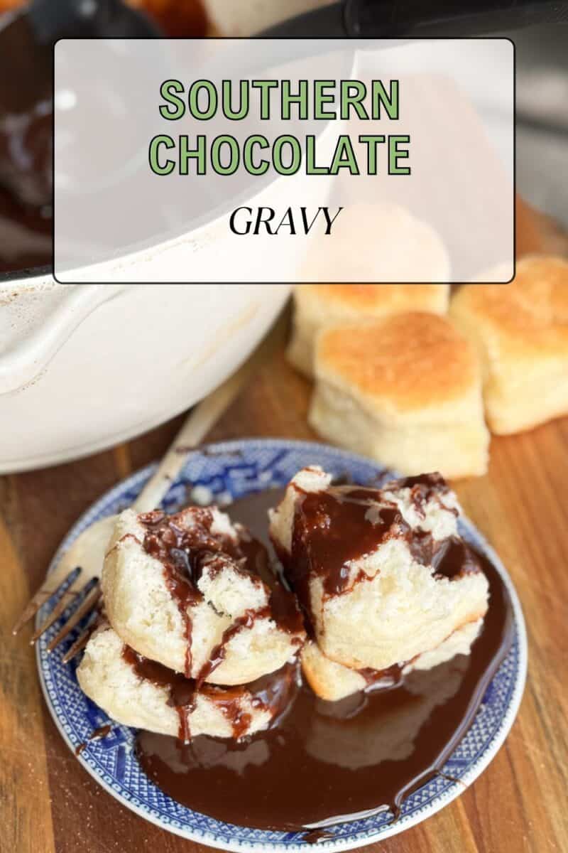 A close-up of a plate with biscuits covered in chocolate sauce. In the background, there is a white bowl with more chocolate sauce and a stack of plain biscuits. The text "Southern Chocolate Gravy" is displayed at the top.