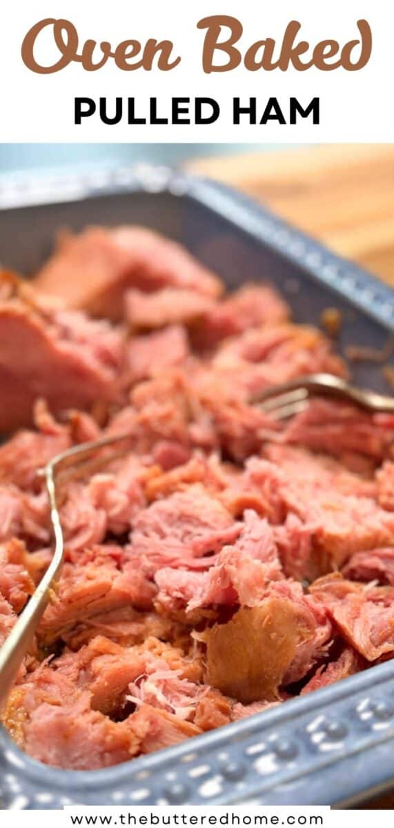 A close-up of shredded pulled ham in a metal tray with serving tongs, labeled “Oven Baked Pulled Ham” at the top and a website URL at the bottom.