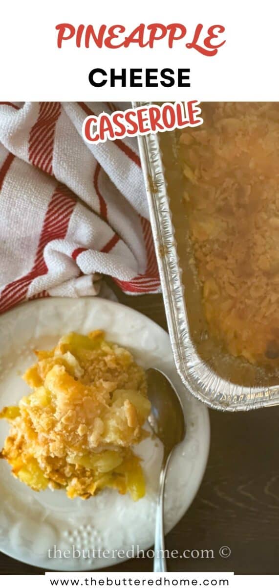 A serving of pineapple cheese casserole on a white plate with a fork, next to a baking dish of the casserole and a red and white striped towel. The text reads "Pineapple Cheese Casserole.