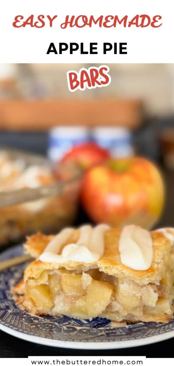 A slice of apple pie bar with a golden crust and white icing sits on a blue-patterned plate. In the background, apples and a baking dish with more apple pie bars are visible. Text reads "Easy Homemade Apple Pie Bars.