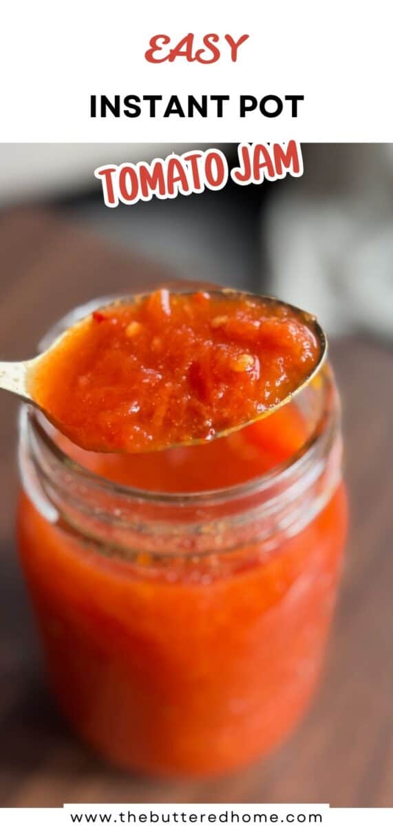A spoonful of chunky red tomato jam held above an open glass jar. The label at the top reads "Easy Instant Pot Tomato Jam," and the website "www.thebutteredhome.com" appears at the bottom.